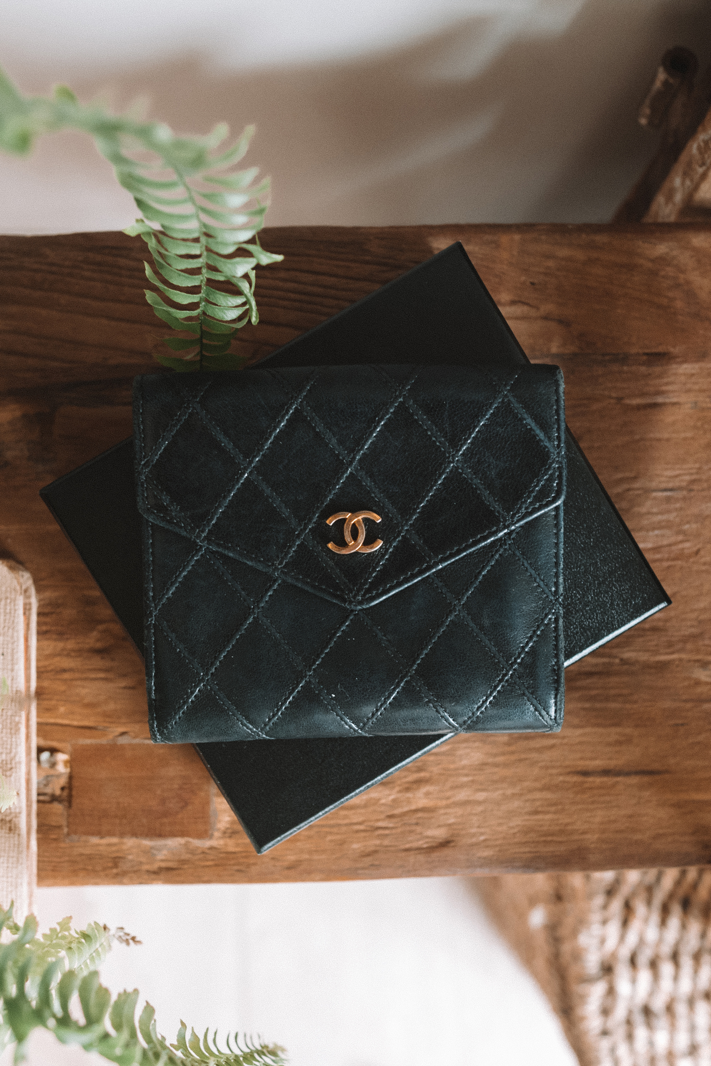 Chanel vintage cosmos bi-fold wallet black gold hardware